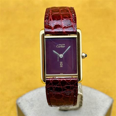 cartier tank must quartz red.